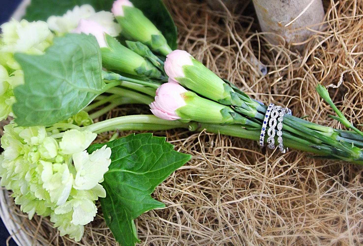 flowers, spring flowers, rings, diamond rings, stackable rings, sapphire ring, moss, bouquet, nosegay