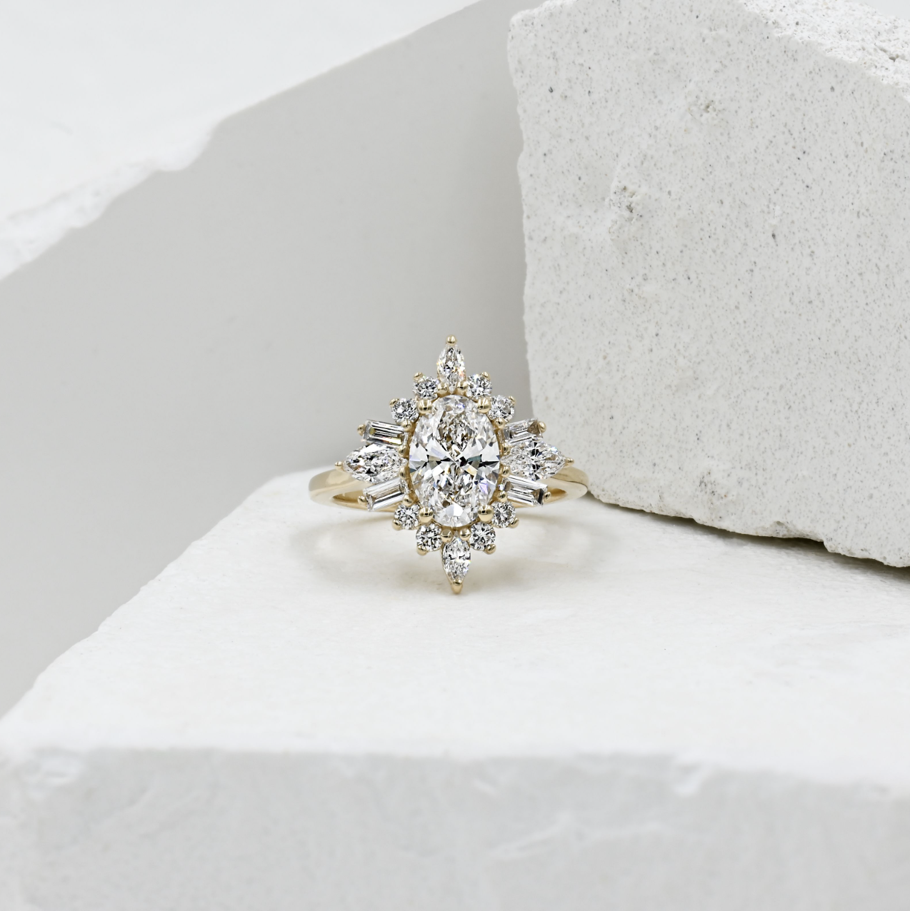 yellow gold ballerina halo style custom oval diamond engagement ring