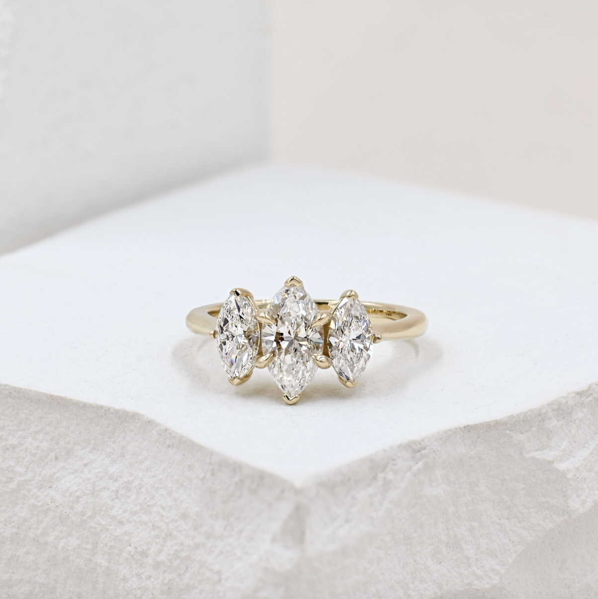 yellow gold three stone marquise diamond engagement ring