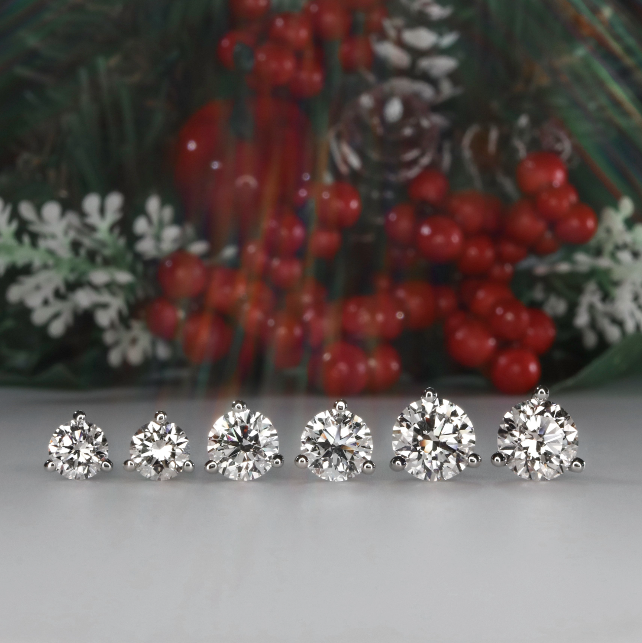 three-prong round brilliant diamond stud earrings