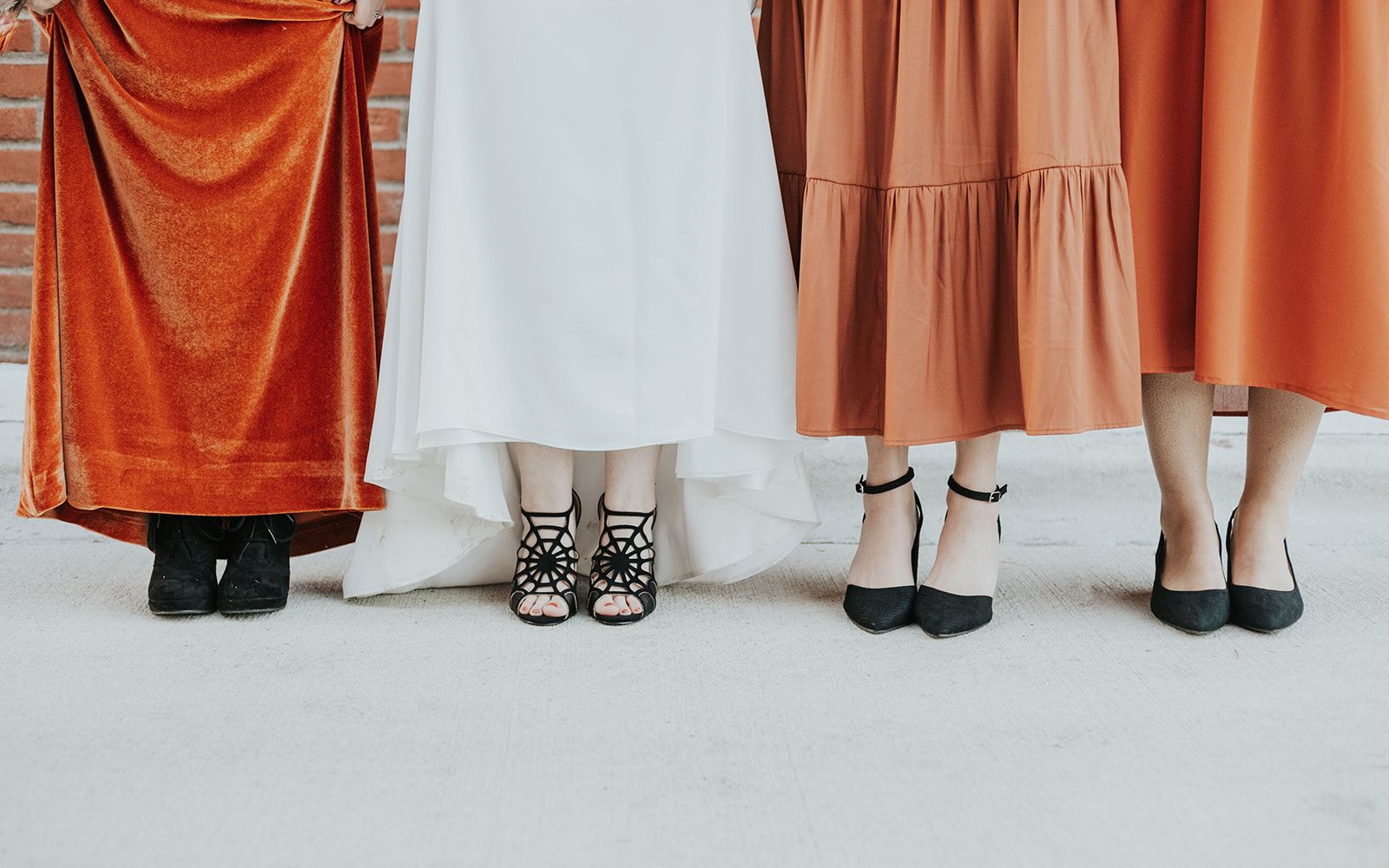 orange bridesmaid dresses for Halloween-themed wedding