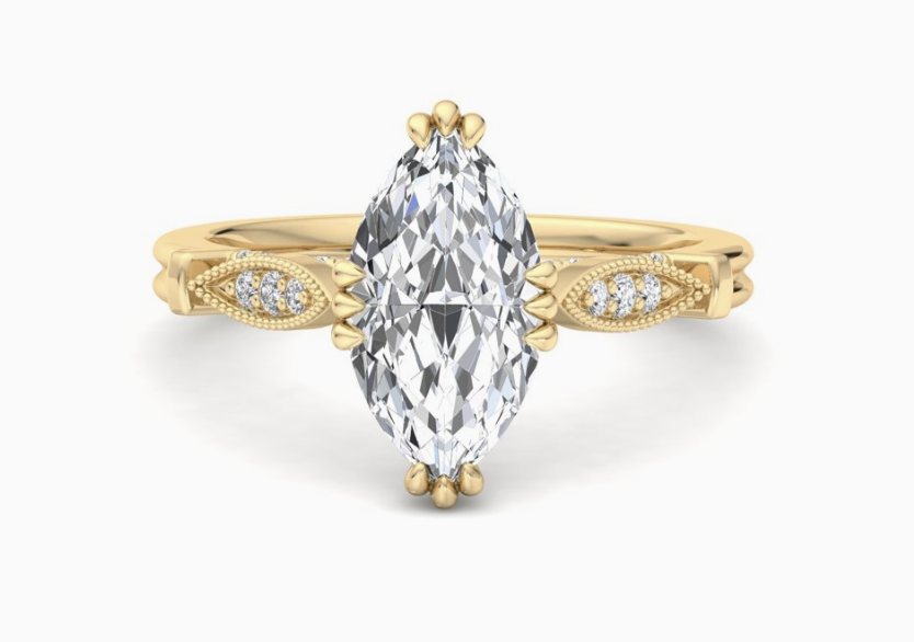 yellow gold marquise shaped engagement ring