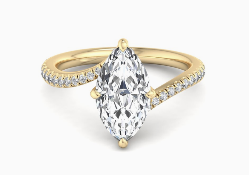yellow gold marquise shaped engagement ring
