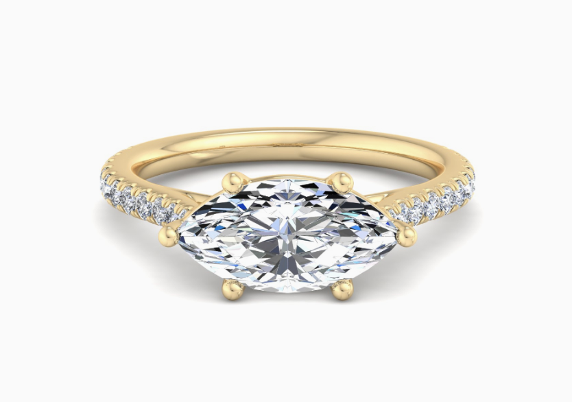 yellow gold marquise shaped engagement ring