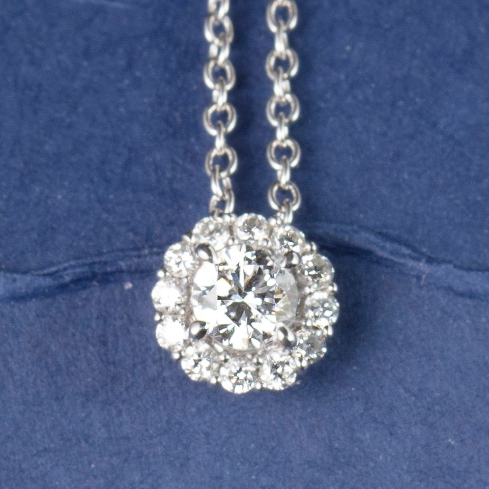 solitaire with halo diamond pendant