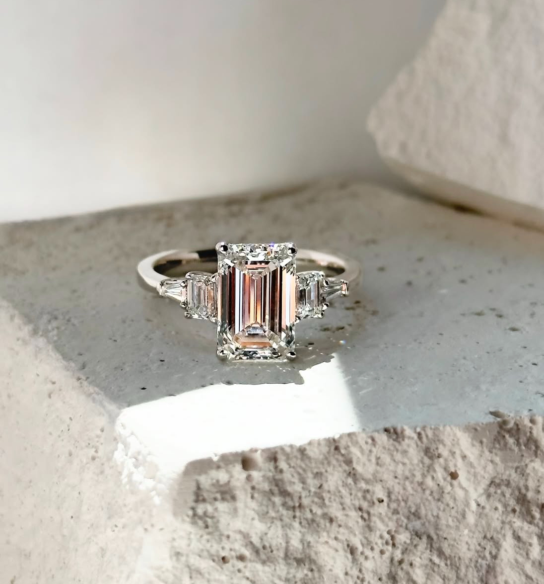 five-stone emerald cut diamond engagement ring