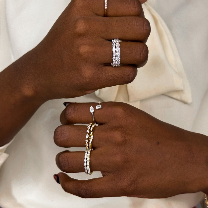 black woman wearing stackable diamond rings