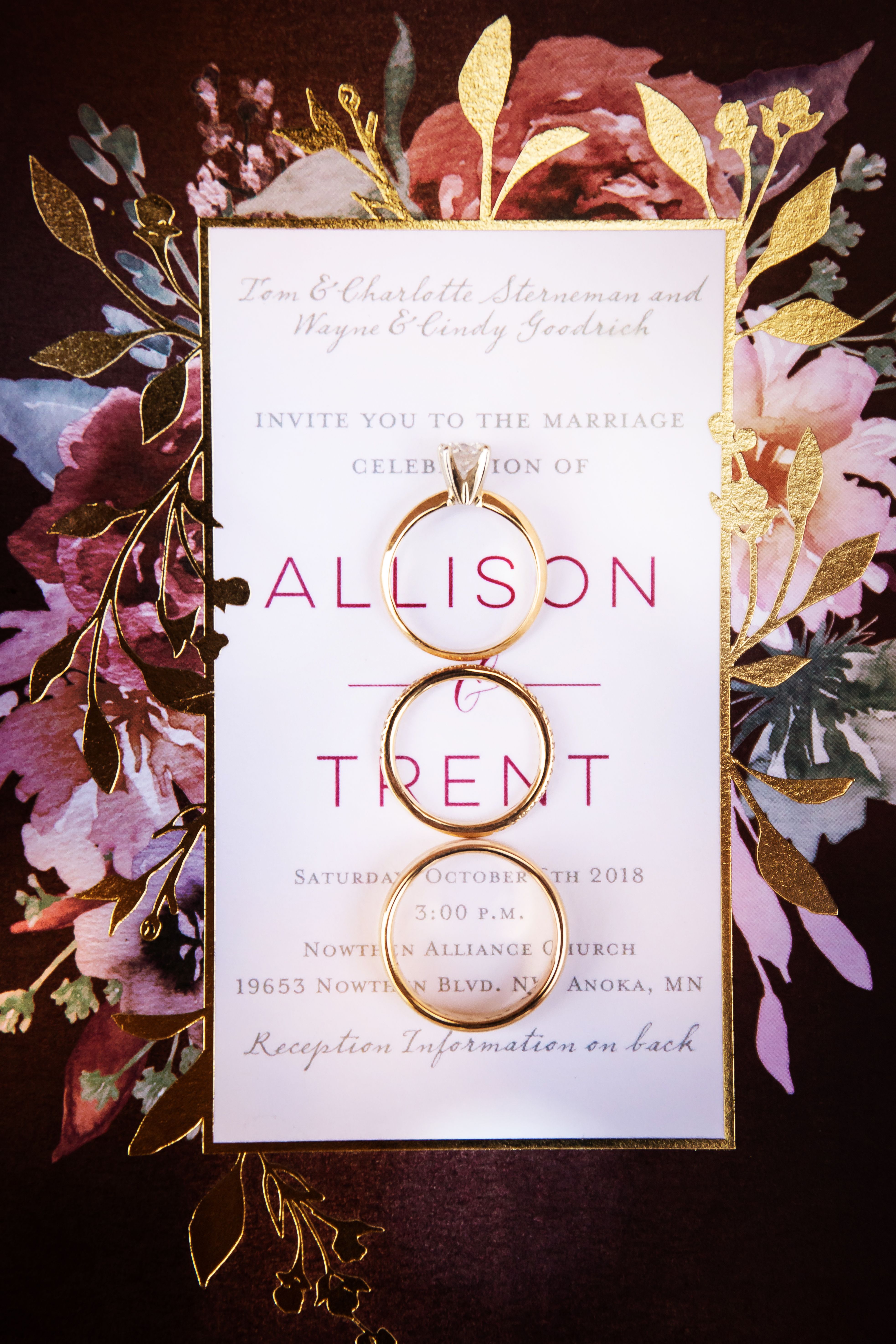 wedding rings with wedding invitation