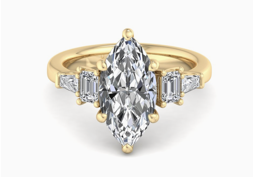yellow gold marquise shaped engagement ring