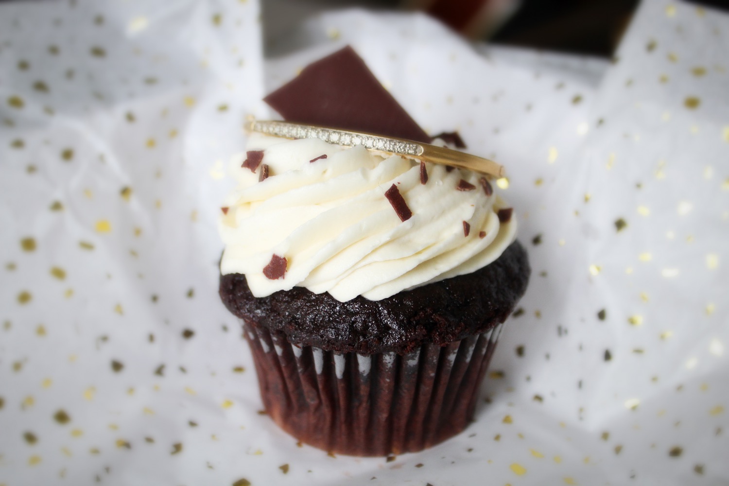 cupcake, diamond bracelet, bangle bracelet, tennis bracelet, chocolate cupcake, vanilla frosting, buttercream frosting