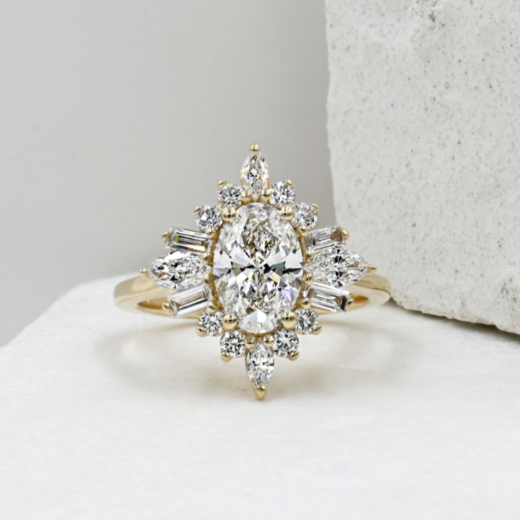 yellow gold ballerina style halo engagement ring