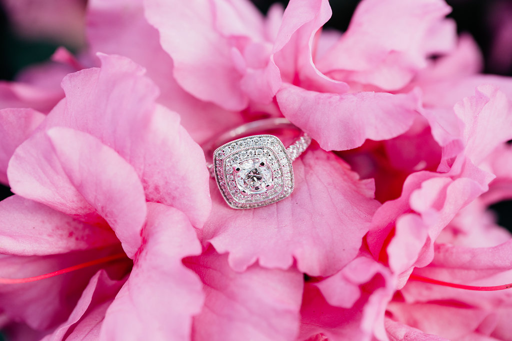 brilliant cut diamond, wedding ring, engagement ring, vintage engagement ring, vintage-styled wedding ring, vintage-styled engagement ring, peony, ring in flower, ring and flowers, pink flowers, diamond, halo style rings, 1920's era ring, antique style ring, Gatsby style ring, vintage style ring, vintage style halo ring