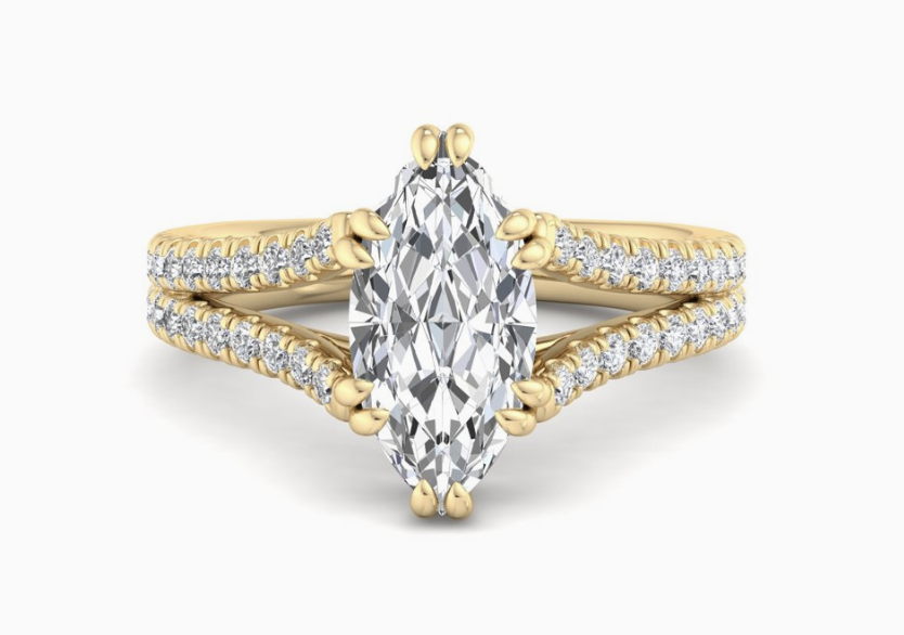 yellow gold marquise shaped engagement ring