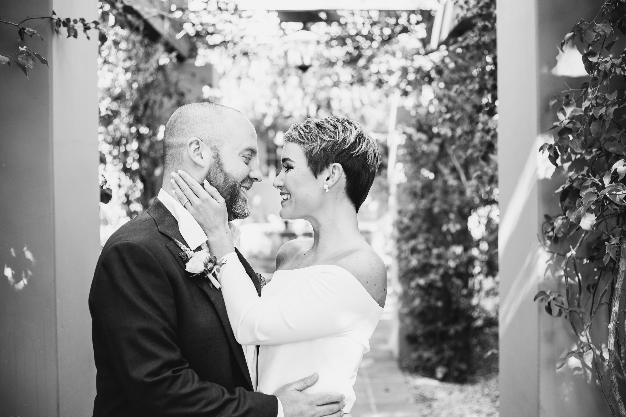 happy bride and groom, wedding couple, short-haired bride, off the shoulder wedding dress, smiling bride