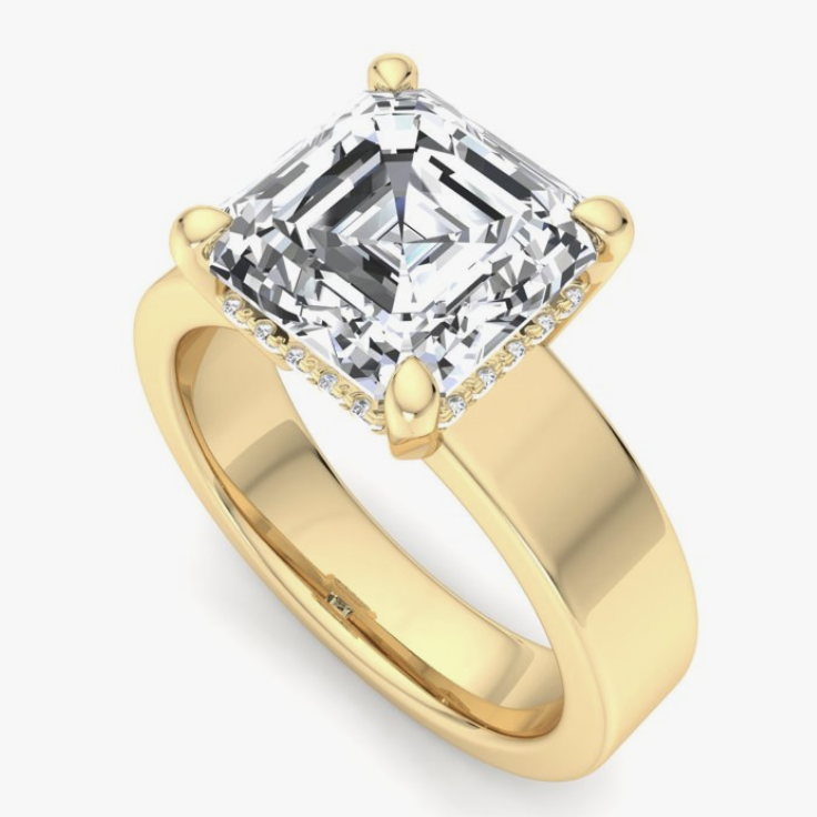 Asscher cut diamond in thick yellow gold band